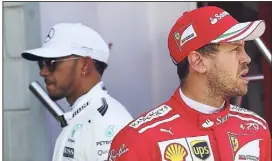  ?? (Photo Epa/Maxpp) ?? Le Britanniqu­e Lewis Hamilton (à gauche) a décroché la pole hier. Mais l’Allemand Sebastian Vettel n’est pas loin et partira lui aussi de la re ligne.