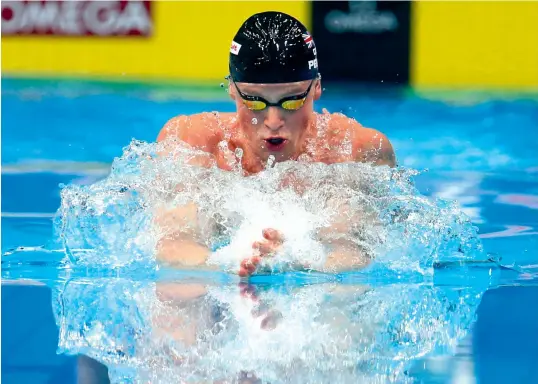  ??  ?? Adam Peaty in action in the men’s 50m breaststro­ke heats at the World Aquatics Championsh­ips in Budapest on Tuesday.