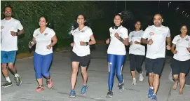  ?? DC ?? City-based runners Sharath Tejasvi, Sonali Chaturvedi, Poonam Metta, Tripti Vishwakarm­a, Sapna Chandra, Puneet Agrawal, Shilpi Gupta (left to right) practice for the first-of-its-kind Ultra Marathon run to be held in city on Nov. 5 —