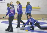  ?? ERIC MCCARTHY/ JOURNAL PIONEER ?? Breanne Burgoyne, second stone on the defending champion Lauren Lenentine rink, prepares to turn her stone over to sweepers Rachel O’Connor, left and the team’s mate, Kristie Rogers. Lenentine won here opening draw 8- 4 over a fellow Cornwall rink...