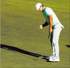  ?? Charlie Riedel ?? The Associated Press Brooks Koepka urges in a birdie putt on the 16th hole during the final round of the U.S. Open on Sunday at Erin Hills. Koepka shot 5-under 67 to win by four strokes. Americans have won it three straight times.