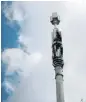  ?? /Reuters ?? Scorcher: A telecom mast damaged by fire in Birmingham, Britain, on April 6 amid fears about 5G tech.