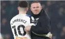  ?? Photograph: Steve Bond/PPAUK/ Shuttersto­ck ?? Wayne Rooney is doing an excellent job in testing circumstan­ces at Derby County.