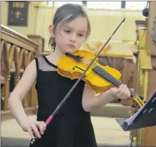  ?? CUTLINE: FRAM DINSHAW/THE NEWS ?? Jaelyn Heighton performed in the Strings Scottish Solo inside St. George’s Anglian Church in New Glasgow this week. She played ‘John Allen’s Jig.’