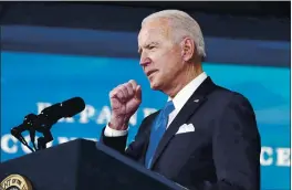  ?? ANDREW HARNIK — THE ASSOCIATED PRESS ?? President Joe Biden speaks in the South Court Auditorium in the Eisenhower Executive Office Building on the White House Campus in Washington on Tuesday.