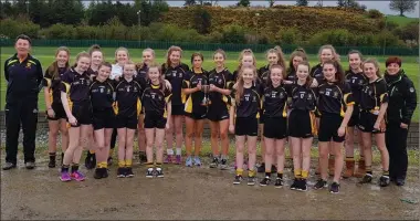  ??  ?? The Mourneabbe­y U-16 team from 2017 with their O’Leary Career Guidance sponsored cup for winning the League