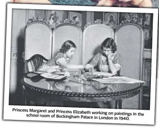  ?? ?? Princess Margaret and Princess Elizabeth working on paintings in the school room of Buckingham Palace in London in 1940.