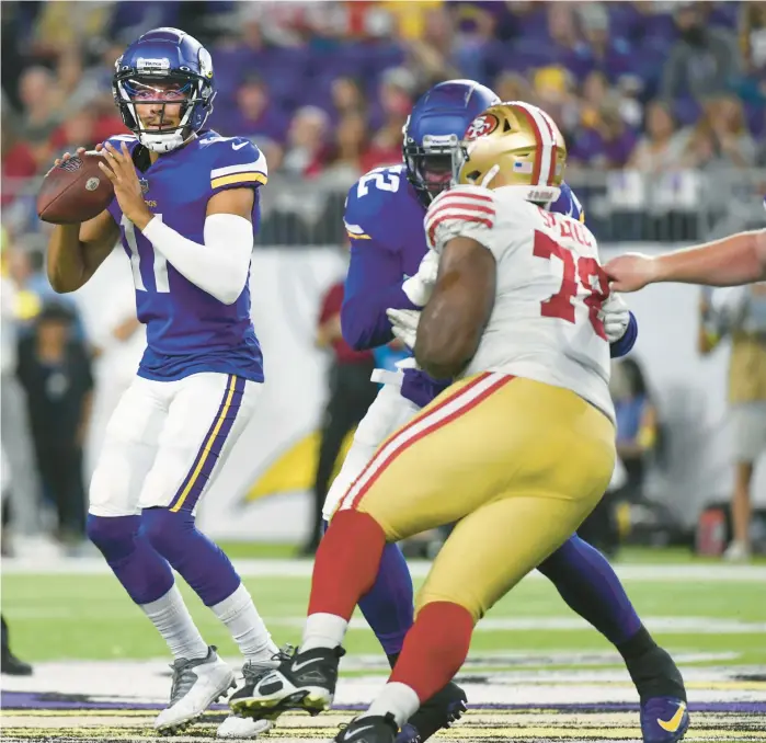  ?? CRAIG LASSIG/AP ?? Vikings quarterbac­k Kellen Mond drops back during a preseason game against the 49ers on Aug. 20 in Minneapoli­s.