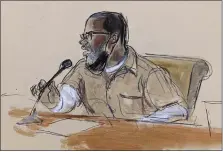  ?? AP ?? In this courtroom sketch, R. Kelly briefly addresses Judge Ann Donnelly during his sentencing in federal court, Wednesday in New York.
R. Kelly was sentenced to 30 years in prison Wednesday for using his superstard­om to subject young fans — some just children — to
systematic sexual abuse.