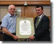  ?? LEFT: BELOW: Photos by Domnick Walsh ?? Mayor of Kerry John Sheahan presents a Mayor’s scroll to Jimmy Laide, Chairman of Kerry Mountain Rescue.
Mayor of Kerry John Sheahan presents the scroll to Jimmy Laide, Chairman of Kerry Mountain Rescue in council chambers. Also in picture (from left)...