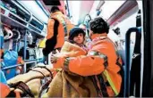  ?? CLAUDIO LATTANZIO/EPA ?? Three children who survived the avalanche that buried a hotel in Italy arrive in Pescara for medical treatment.