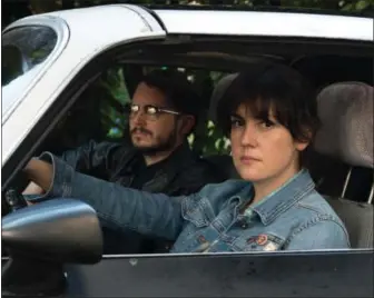  ??  ?? Elijah Wood and Melanie Lynskey in “I Don’t Feel at Home in This World Anymore” on Netflix.