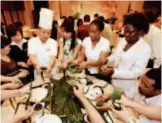  ??  ?? May 23, 2009: Over 130 foreigners who work or study in Nanjing, capital of Jiangsu Province, celebrate the Dragon Boat Festival by participat­ing in a rice dumpling-making competitio­n. VCG