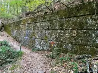  ?? Photo by Corbet Deary of The Sentinel-record ?? ■ A section of West Mountain Trail leads within feet of the remains of a shooting range where baseball icon Babe Ruth once honed his shooting skills.