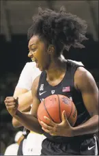  ?? Robert Franklin / Associated Press ?? UConn’s Christyn Williams celebrates during the first half against Notre Dame on Sunday.