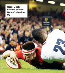  ??  ?? Hero: Josh Adams scores Wales’ winning try