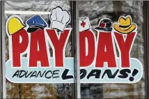  ?? NICK GRAHAM / DAYTON DAILY NEWS ?? House Bill 3081 and Senate Bill 1530 would pre-empt local ordinances adopted in at least 42 Texas cities that put basic standards into place to address predatory practices in payday and car title lending.