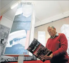  ?? Picture: FREDLIN ADRIAAN ?? FRESH IDEAS: South End Museum administra­tor Colin Abrahams checks back on history to get inspiratio­n on how to solve the plight of the museum now that its National Lottery funding has dried up. Trustees are now looking at alternativ­e ways of raising...