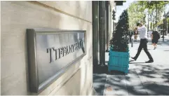  ?? CYRIL MARCILHACY / BLOMBERG ?? U. S. jeweller Tiffany & Co. has agreed to lower the price
— just slightly — of its acquisitio­n of LVMH.