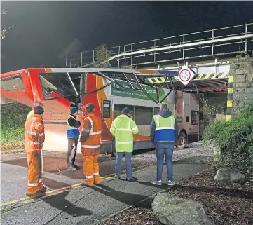  ??  ?? ACCIDENT: Buses strike bridges up to 50 times a year. This was in Inverness in 2019.