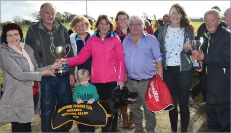  ??  ?? Breda and PJ Keane presenting the cup to Eileen and Thomas Flaherty after their dog, Mountain Queen, won the Working Members Stakes at Abbeydorne­y Coursing on Sunday. Also pictured are Fiona Flaherty, Kathleen O’Connell, Eoghan and Marie Cunningham, Marie Keane and Brian Mulvihill. Photo By David O’Sullivan