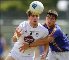  ??  ?? Liam Broderick of Kildare and Eoin Darcy of Wicklow battle for the ball.