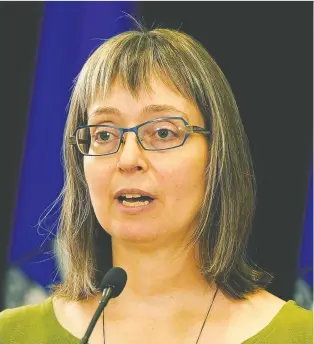  ?? LARRY WONG ?? Dr. Deena Hinshaw, Alberta's chief medical officer of health, said Friday “it is clear that we are at risk of exceeding our province's ICU capacity if we do not make changes to our approach.”