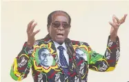  ?? TSVANGIRAY­I MUKWAZHI/ASSOCIATED PRESS ?? Zimbabwean President Robert Mugabe addresses people at an event before the closure of his party’s 16th Annual Peoples Conference in Masvingo on Dec. 17.
