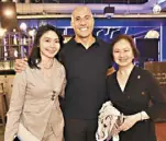  ??  ?? Rovilson Fernandez (center) with City of Dreams Manila director for public relations Mina Gervacio and VP for public relations Charisse Chuidian.
