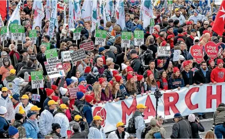  ?? AP ?? Anti-abortion activists gather on Capitol Hill in Washington yesterday during the first March for Life since the Supreme Court overturned the Roe vs. Wade decision that created a legal right to an abortion in the United States.