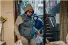  ??  ?? Jeanette Ortiz, left, and her mother, Miriam Morales, pick up food from the Lehigh Valley Second Harvest food pantry in Allentown on Friday. Photograph: Hannah Yoon/The Guardian