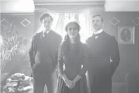  ??  ?? This image released by Netflix shows Henry Cavill, from left, Millie Bobby Brown and Sam Claflin in a scene from “Enola Holmes.”