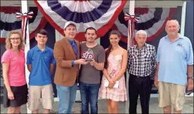  ??  ?? Tyler Andal (center) of Nashville won the Randall Franks Trophy at the 1890s Day Old Time Fiddle Convention on May 26. In the fiddle-off, he faced Marcia Denton (left) of Murfreesbo­ro, Tenn., winner of the 51 and up category, who won fourth, Benjamin...