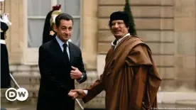  ??  ?? A photo from better times for Nicolas Sarkozy: Shaking hands with Libya's dictator Muammar Gaddafi in 2007