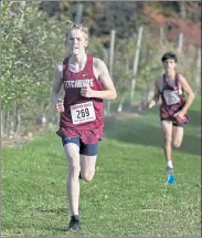  ?? SENTINEL & ENTERPRISE/JOHN LOVE FILE ?? Fitchburg High’s Liam Goodlett runs during the Mid-Wach championsh­ip meet at Hollis Hill Farm on Oct. 26.