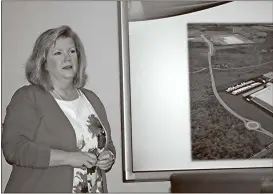  ?? Doug Walker / Rome News-Tribune ?? Melinda Lemmon, executive director of the Cartesvill­e-Bartow County Office of Economic Developmen­t explains plans for a new $100
million Lidl grocery warehouse and distributi­on center that will be located in the Highland 75 Industrial Park off I-75...