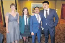  ??  ?? High-school debate liaison Elisa Frank, left, debate tournament top speaker Chelli Shapiro and gold-medal winners Sunint Bindra and Hanbo Yu.