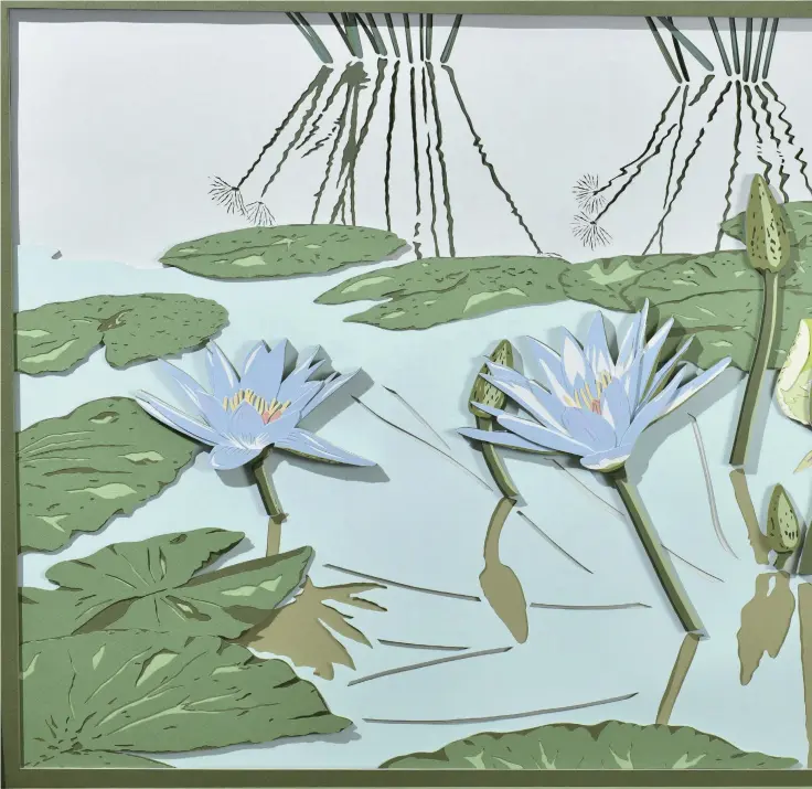  ?? ?? Yomiuri Shimbun photos
“Suiren” (Water lilies) by Keizo Hayashi depicts water lilies and their reflection­s on water through many layers of gradated colored paper that have been intricatel­y carved.
