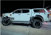  ?? ?? Daryll Lay and five other Mongrel Mob members were in this ute chasing a car containing Black Power members when it crashed into a car at the Te Ngae Rd and Tarawera Rd intersecti­on.