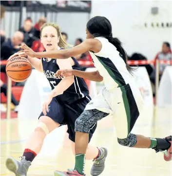  ?? SUPPLIED PHOTO ?? Niagara’s Alyssa McCabe, left, drives the ball against Algonquin in the Ontario women’s basketball championsh­ips at Seneca College Saturday in Toronto. She was selected as the Knights female athlete of the week.