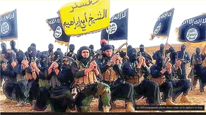  ??  ?? An ISIS propaganda photo shows some of its fighters in Iraq.