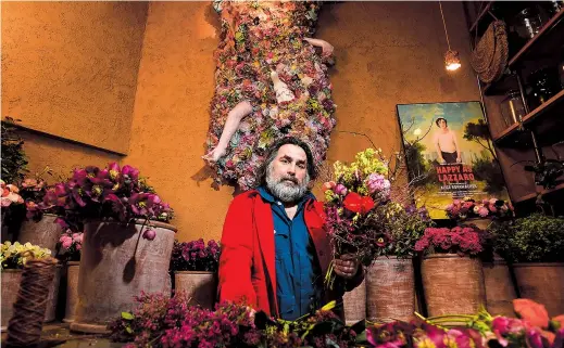  ??  ?? French floral artist Thierry Boutemy poses in his atelier and flower shop in Brussels. — AFP