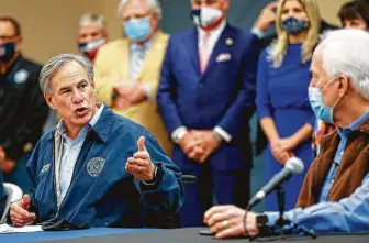  ?? Godofredo A. Vásquez / Staff photograph­er ?? Gov. Greg Abbott, shown with Sen. John Cornyn at a “Back the Blue” event Oct. 28 in Houston, has not held a news conference on the coronaviru­s pandemic in more than a month.