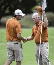  ?? RALPH BARRERA / AMERICAN-STATESMAN ?? Scottie Scheffler (left, with UT coach John Fields) will play in the U.S. Open for the second time. He missed the cut last year at Oakmont.