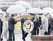  ?? U.S. EMBASSY ?? Rahm Emanuel, the U.S. ambassador to Japan, prepares to lay a wreath Saturday in Hiroshima, Japan.