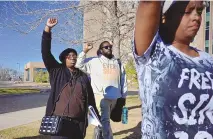  ?? HYOUNG CHANG/THE DENVER POST ?? Sheneen McClain, left, the mother of Elijah McClain, and a supporter leave the Adams County Justice Center in Brighton, Colo. on Friday.