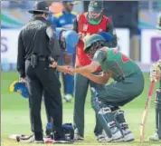  ?? AFP PHOTO ?? Bangladesh's Tamim Iqbal returned as the last man to help put on 32 runs with Mushfiqur Rahim.
