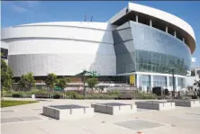  ?? Paul Chinn / The Chronicle ?? Above: Chase Center is slated to open in the fall. Left: “Double Jump” will hang in the arena’s east entryway.