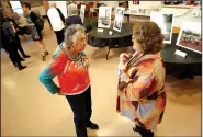  ?? NWA Democrat-Gazette/DAVID GOTTSCHALK ?? Betty Christian (left) speaks Wednesday with Kelly Colebar, Fayettevil­le Community Resources Division community resources administra­tor, during a reception at the Fayettevil­le Senior Activity and Wellness Center