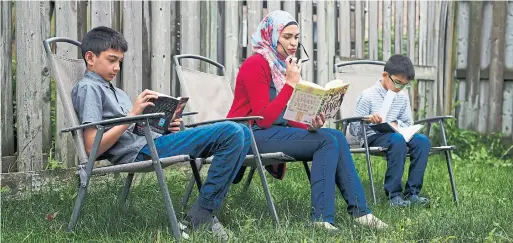  ?? COLE BURSTON/TORONTO STAR ?? Although she’s raising two boys, Uzma Jalaluddin was influenced by The Confidence Code for Girls, finding the advice great for tweens and the women who raise them.